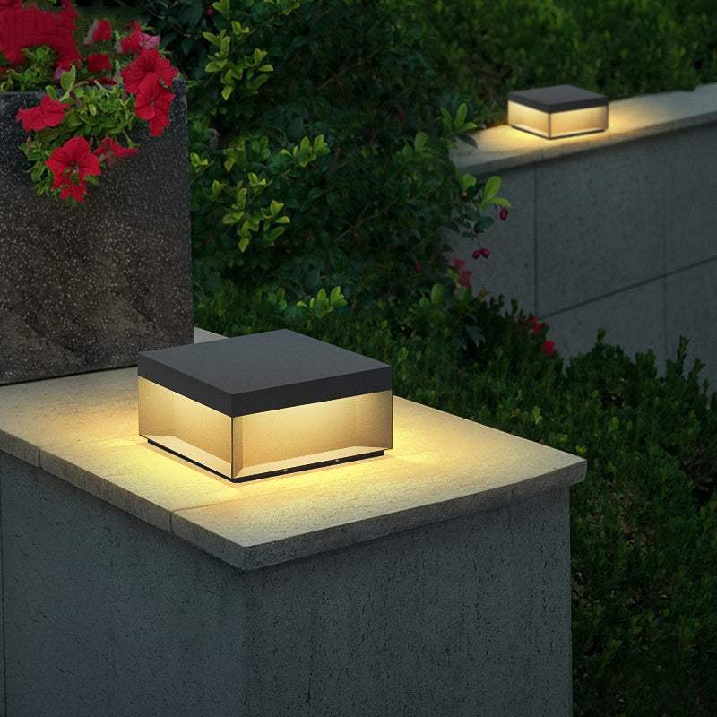 Waterproof solar garden lights illuminating a gravel pathway.