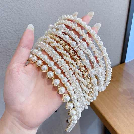 Thin pearl headbands with imitation pearls and metal, shown in a variety of designs.