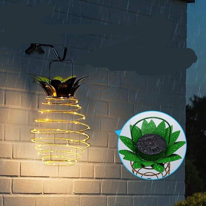 Outdoor waterproof pineapple solar lights with warm LED bulbs, ideal for garden decor.