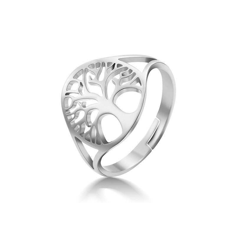 Tree of Life stainless steel rings in silver, rose gold, and gold with a retro hollow design.