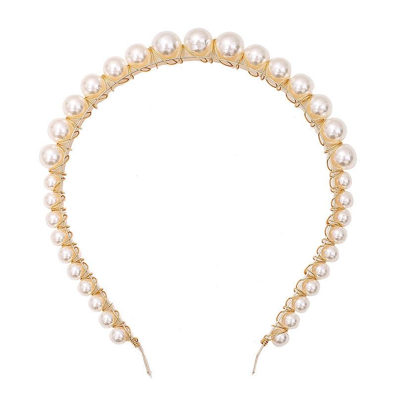 Thin pearl headbands with imitation pearls and metal, shown in a variety of designs.
