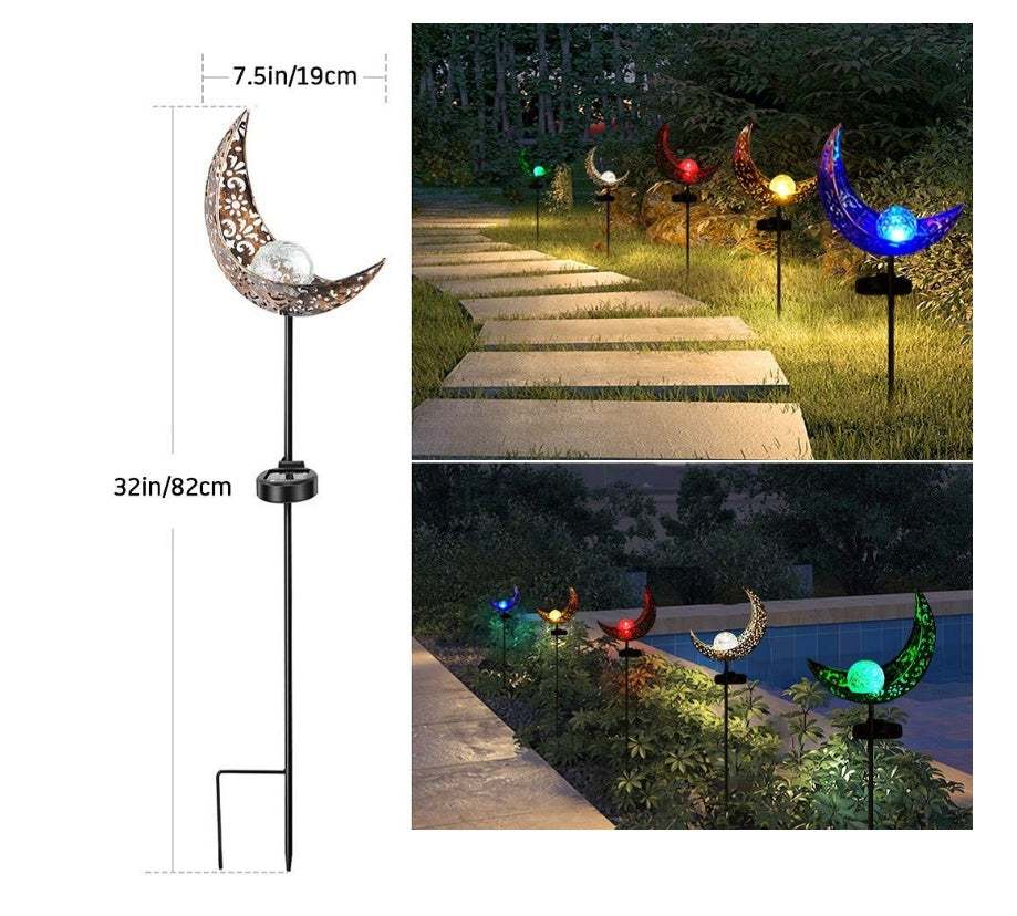 LED Solar Flame Light in decorative flame design illuminating garden at night.