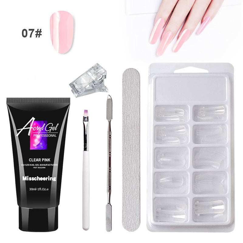 Extension Gel Nail Art Kit with accessories including UV/LED lamp, nail tools, and crystal gel.