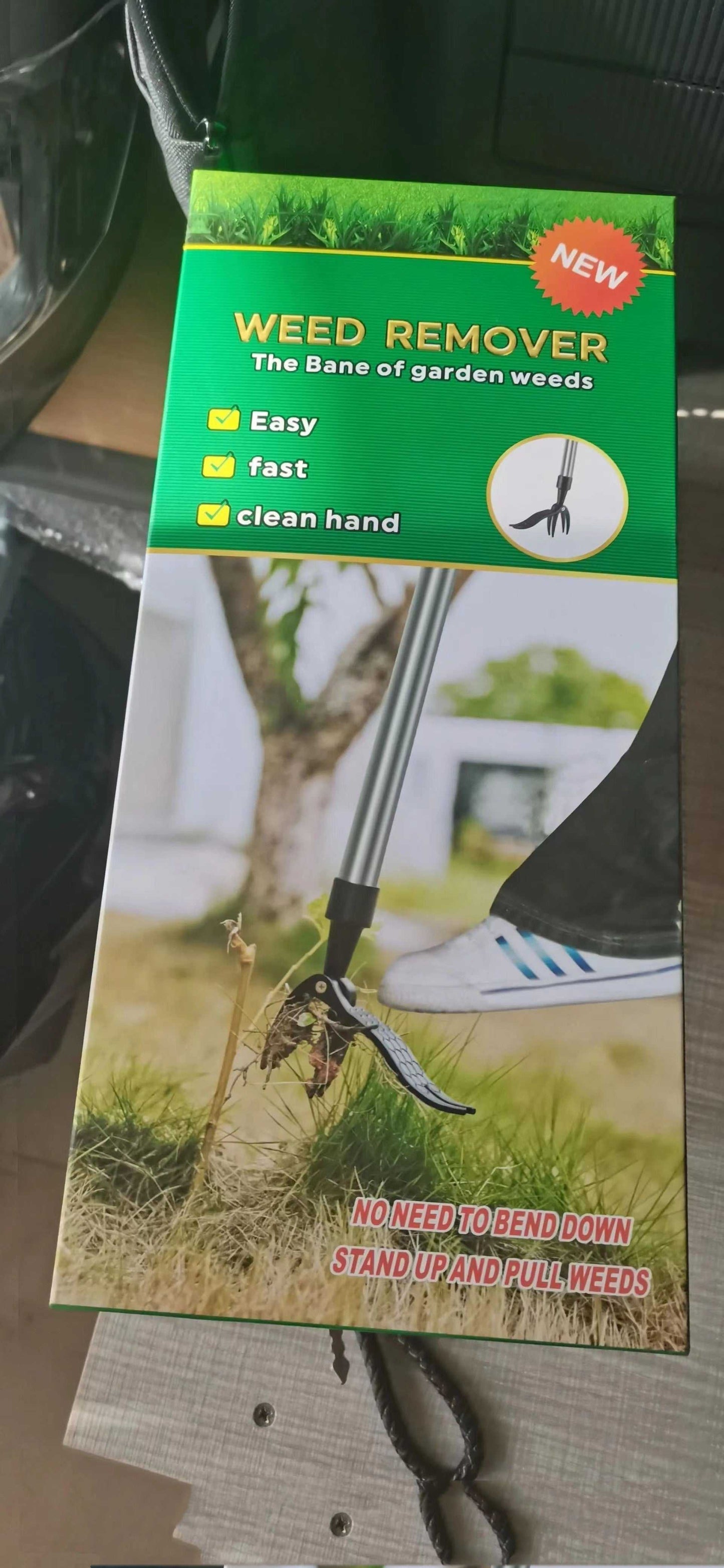 packing list Standing weeding uproot tool removing weeds with black alloy and stainless steel design.