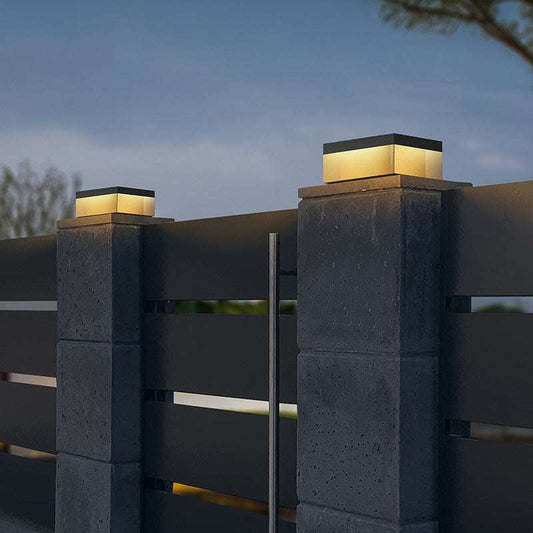 Waterproof solar garden lights illuminating a gravel pathway.