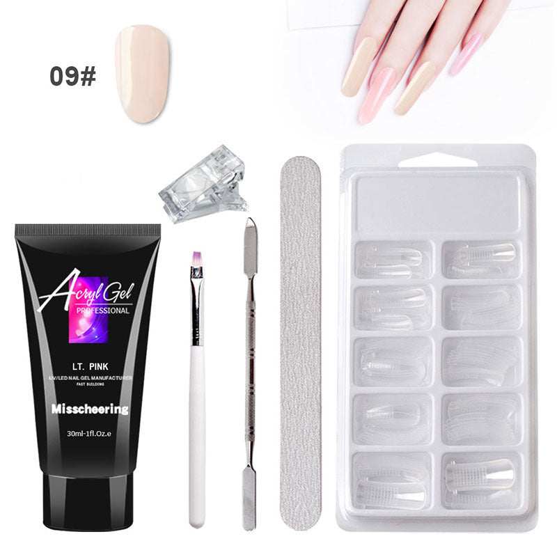 Extension Gel Nail Art Kit with accessories including UV/LED lamp, nail tools, and crystal gel.
