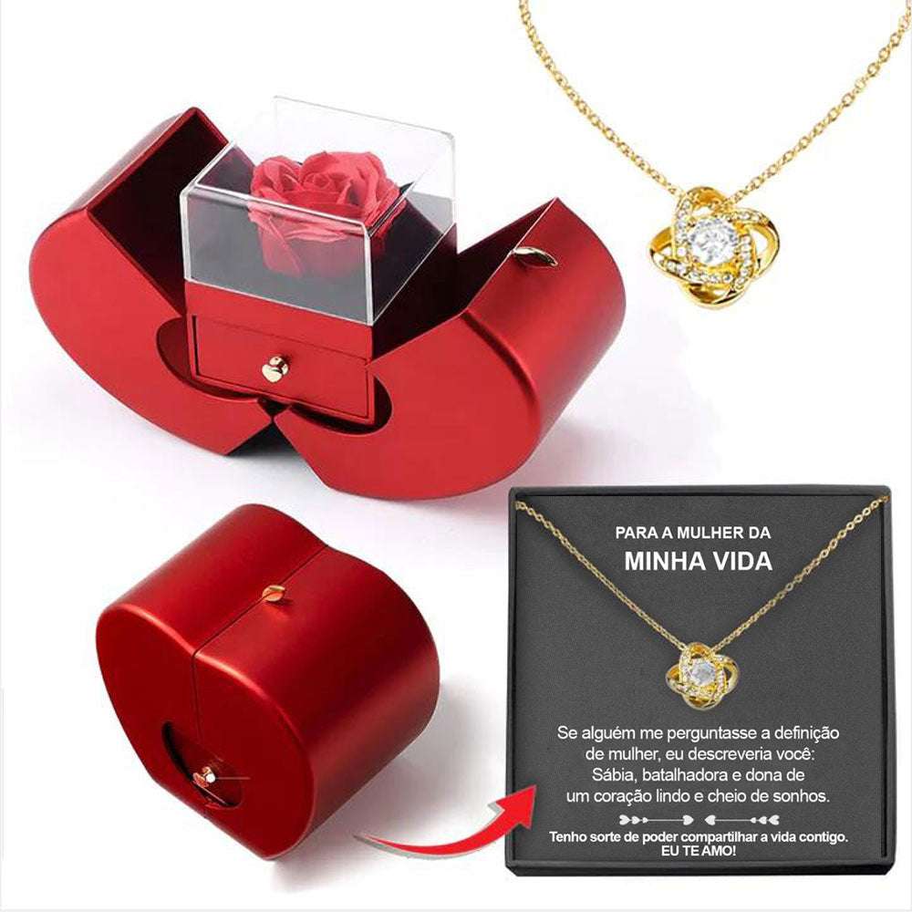 Red apple-shaped fashion jewelry box with eternal rose and necklace, perfect Christmas or Valentine's Day gift.