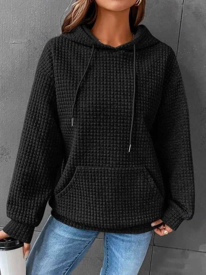 Women's loose casual solid color long-sleeved sweater with hood, available in multiple colors.