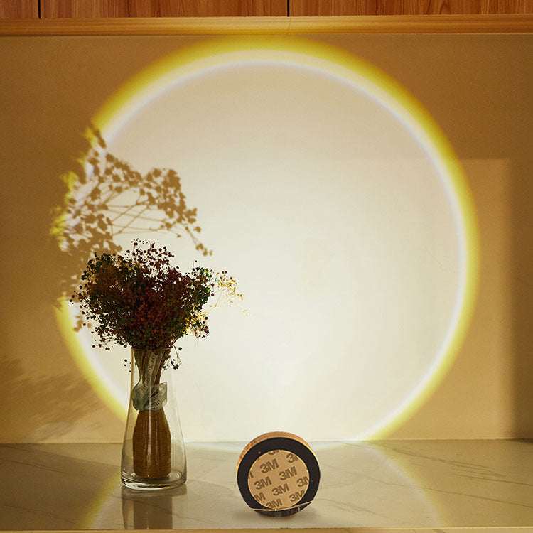 LED lights under cabinet creating colorful sunset effect in a kitchen setting.