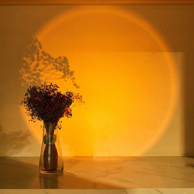 LED lights under cabinet creating colorful sunset effect in a kitchen setting.