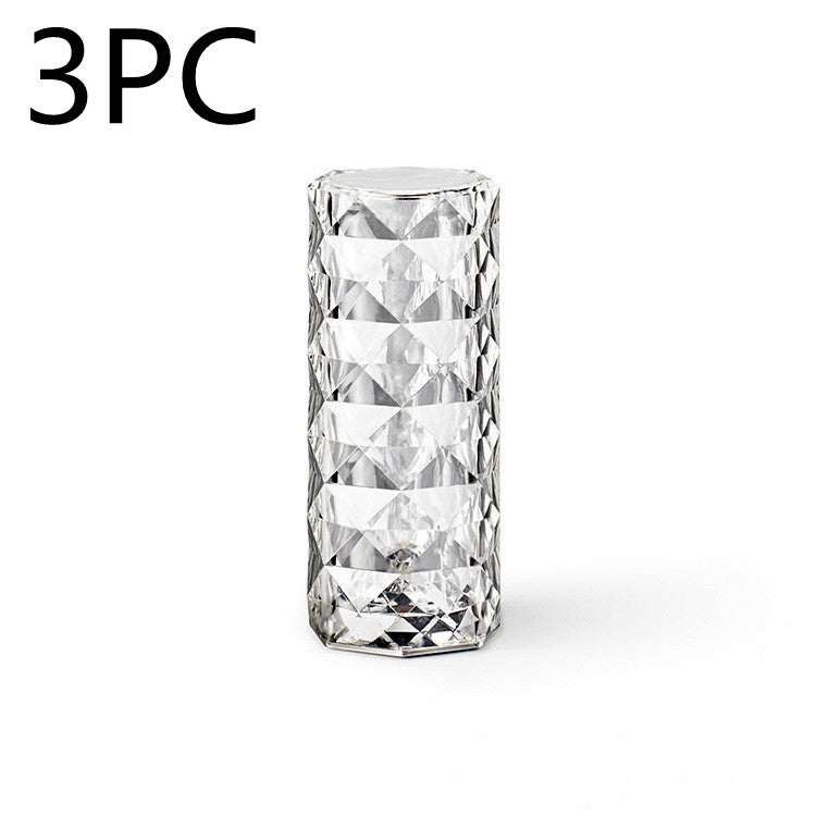 USB Table Lamps Nordic crystal USB table lamp with diamond design, touch dimming, and rose projector effect for bedroom decor.
