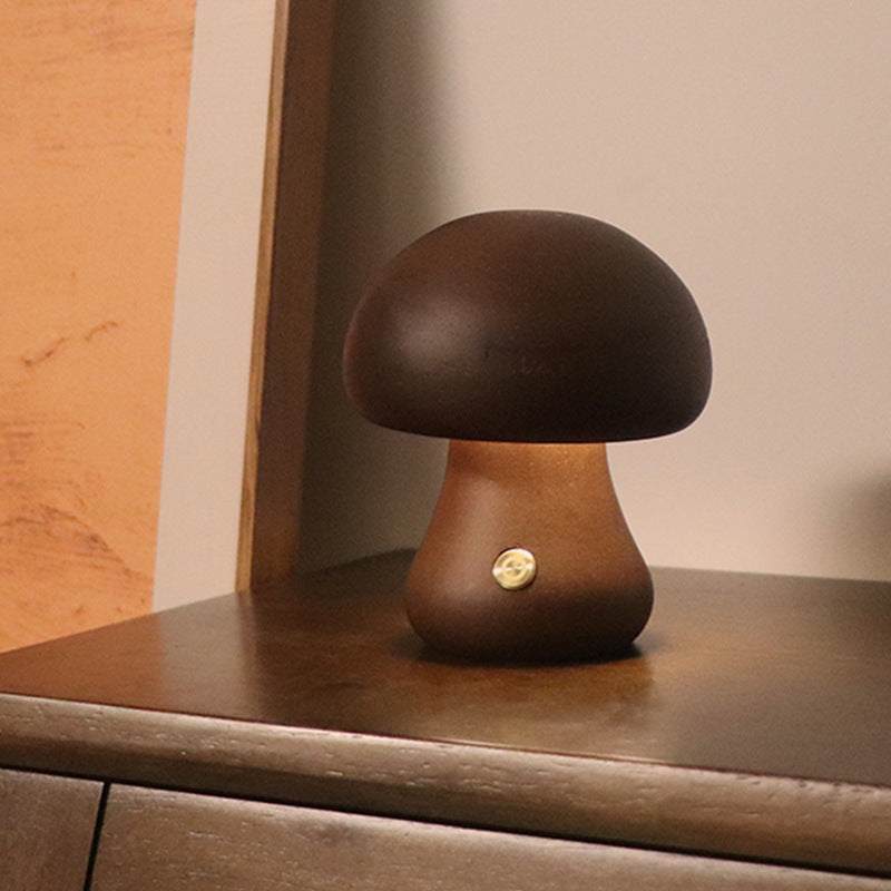 Wooden cute mushroom LED night lights on a bedside table, suitable for children's room decor.