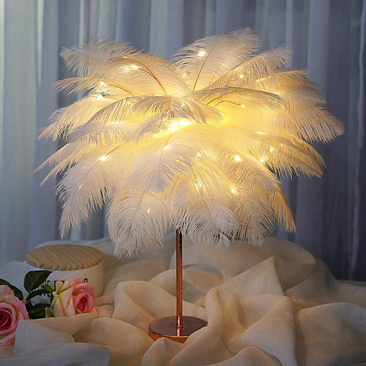 Nordic feather lamp with warm LED lights on a wooden base, perfect for bedroom decoration.