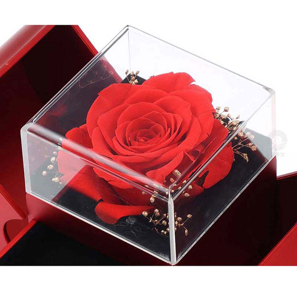 Red apple-shaped fashion jewelry box with eternal rose and necklace, perfect Christmas or Valentine's Day gift.