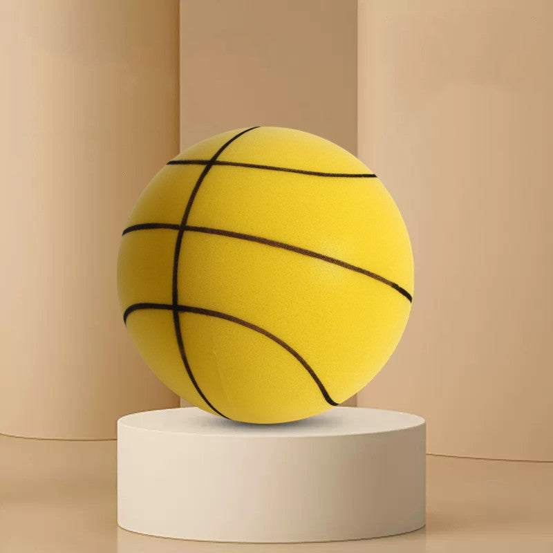 Child playing with Silent Sports Ball indoor basketball set, featuring vibrant bouncy balls in various colors and a hoop.