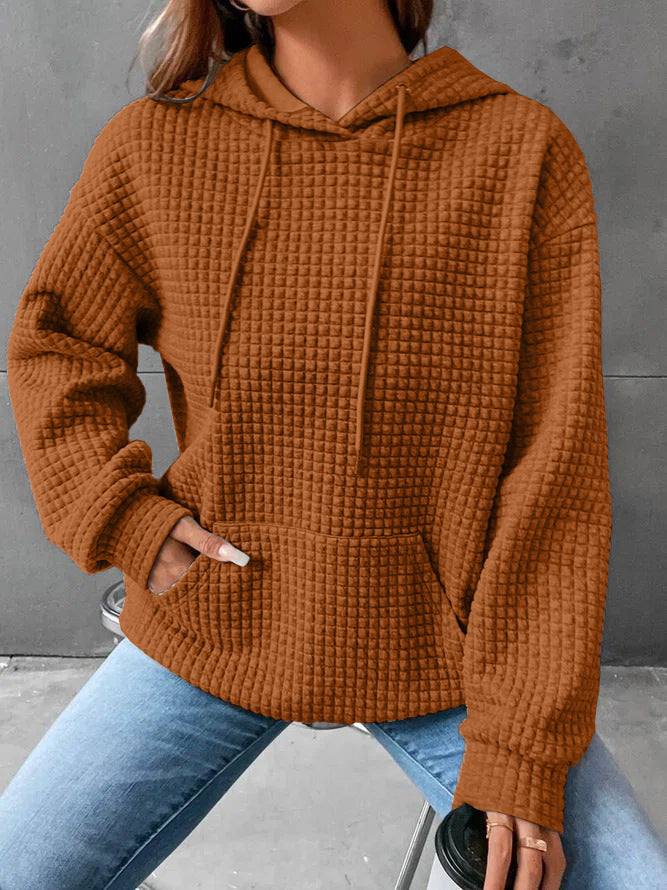 Women's loose casual solid color long-sleeved sweater with hood, available in multiple colors.