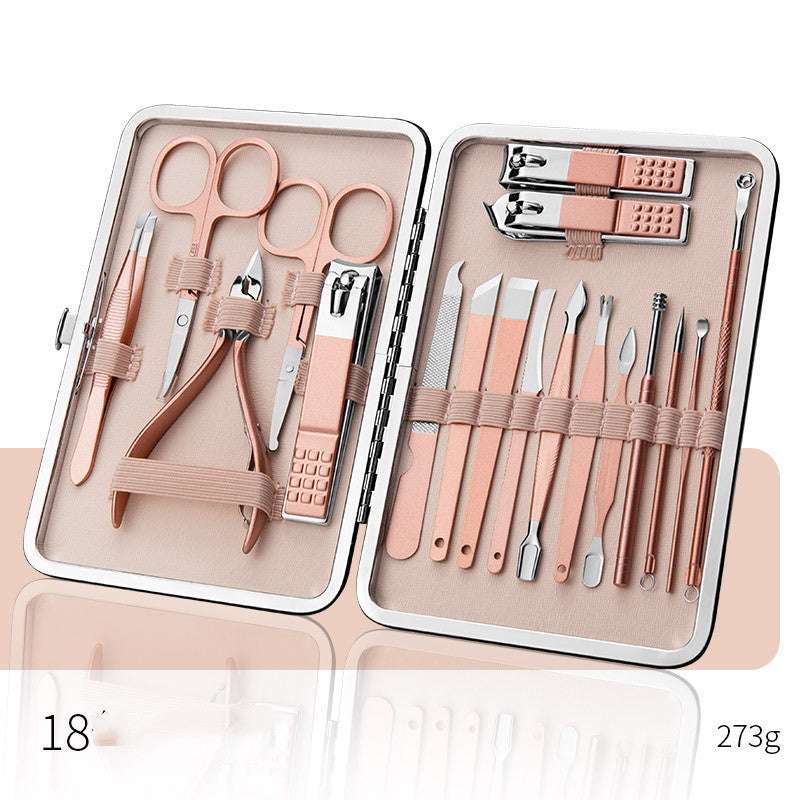Professional nail clippers set with high-quality stainless steel tools in a rose gold leather case.