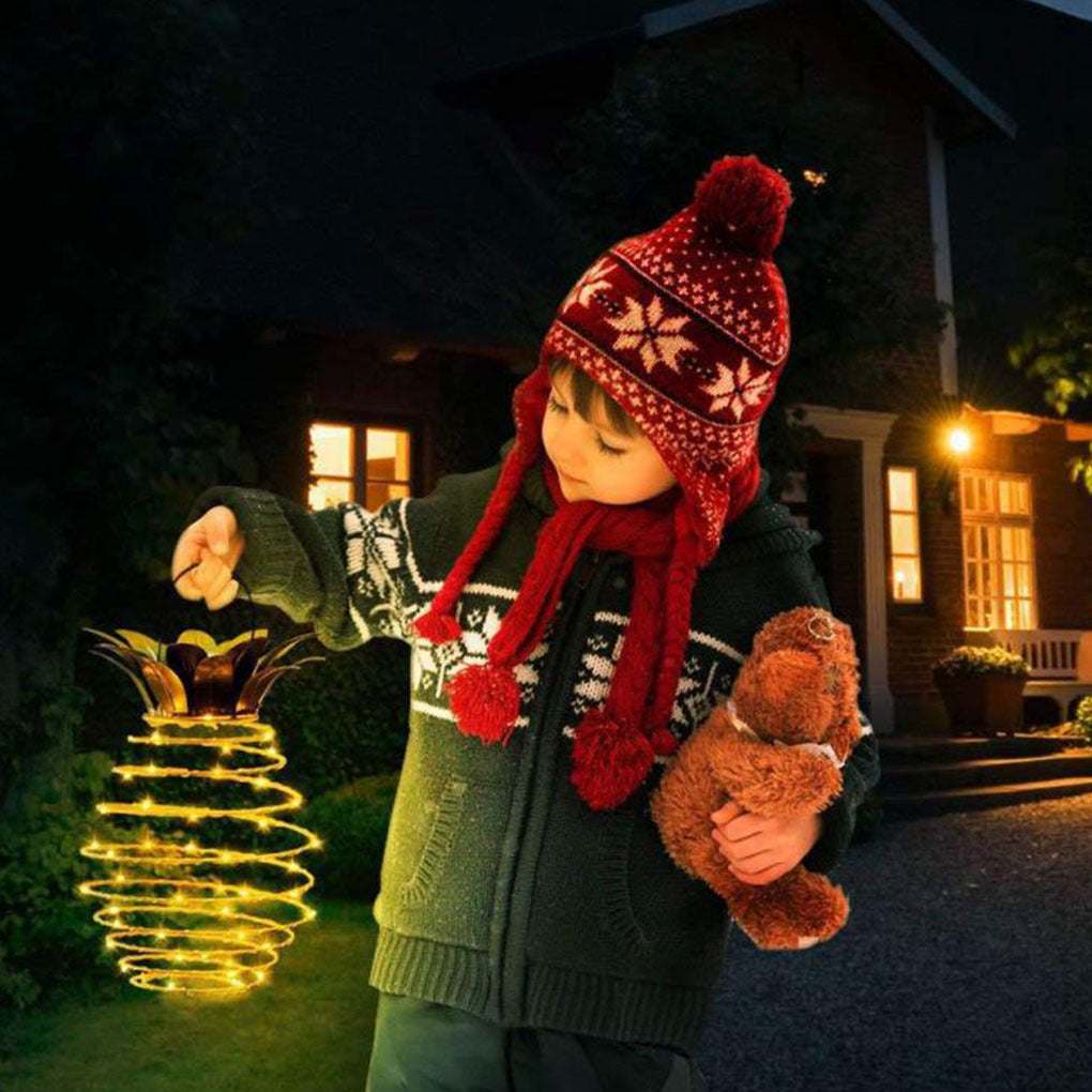Outdoor waterproof pineapple solar lights with warm LED bulbs, ideal for garden decor.