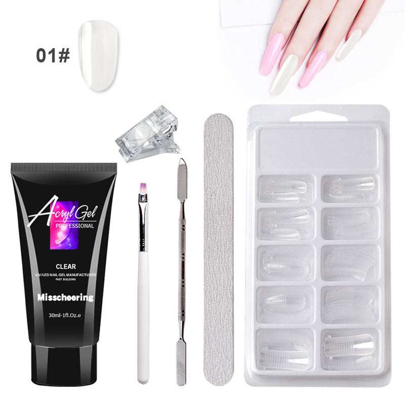 Extension Gel Nail Art Kit with accessories including UV/LED lamp, nail tools, and crystal gel.