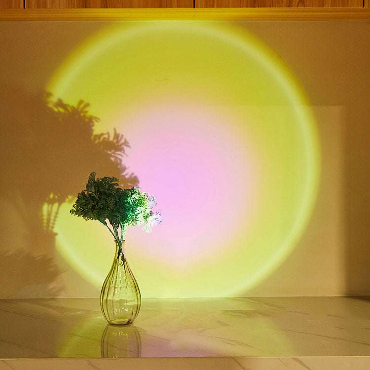LED lights under cabinet creating colorful sunset effect in a kitchen setting.
