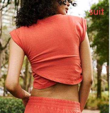 Ladies two-piece set with sleeveless top and sweatpants, dark color, casual style.