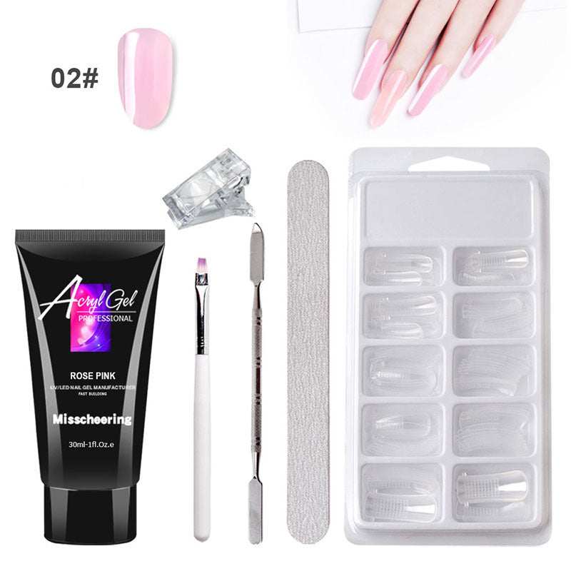 Extension Gel Nail Art Kit with accessories including UV/LED lamp, nail tools, and crystal gel.