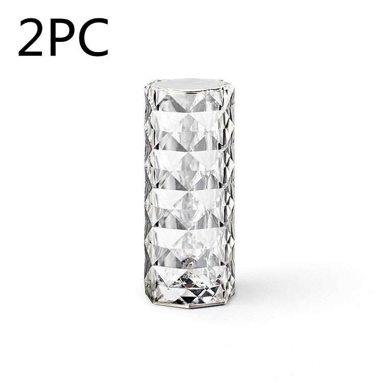 USB Table Lamps Nordic crystal USB table lamp with diamond design, touch dimming, and rose projector effect for bedroom decor.