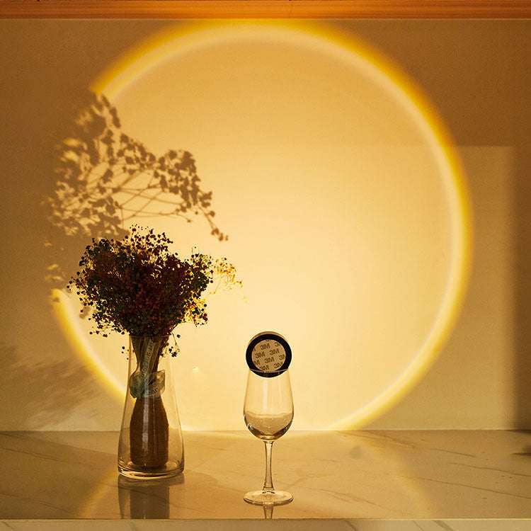 LED lights under cabinet creating colorful sunset effect in a kitchen setting.