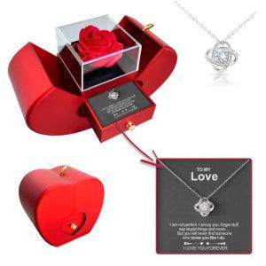 Red apple-shaped fashion jewelry box with eternal rose and necklace, perfect Christmas or Valentine's Day gift.