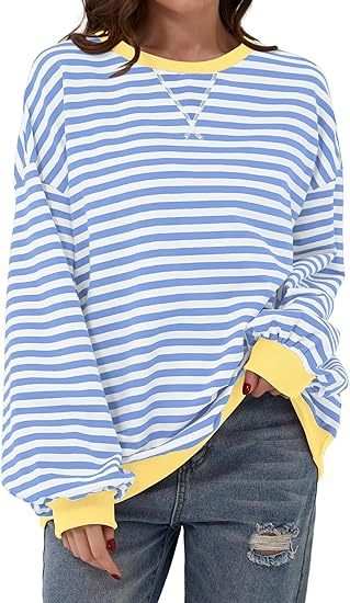 Striped sweatshirt in contrasting blue and white with yellow accents.
