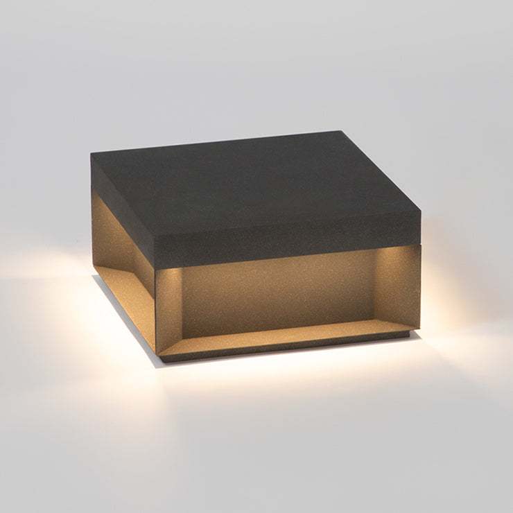 Waterproof solar garden lights illuminating a gravel pathway.