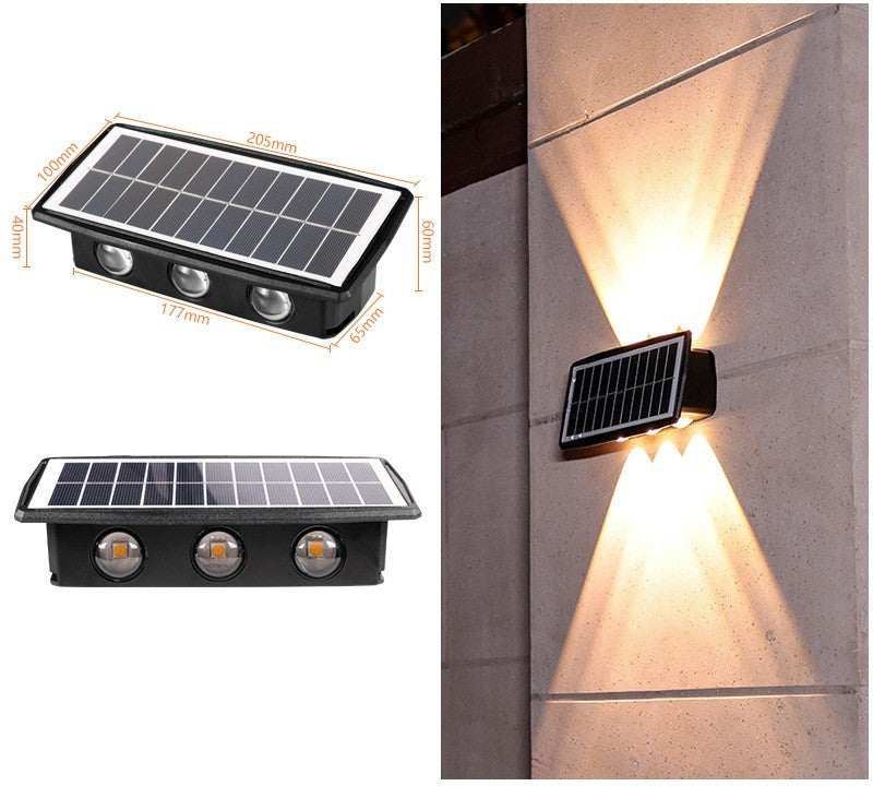 Solar outdoor wall lights illuminating a stone wall with warm light.
