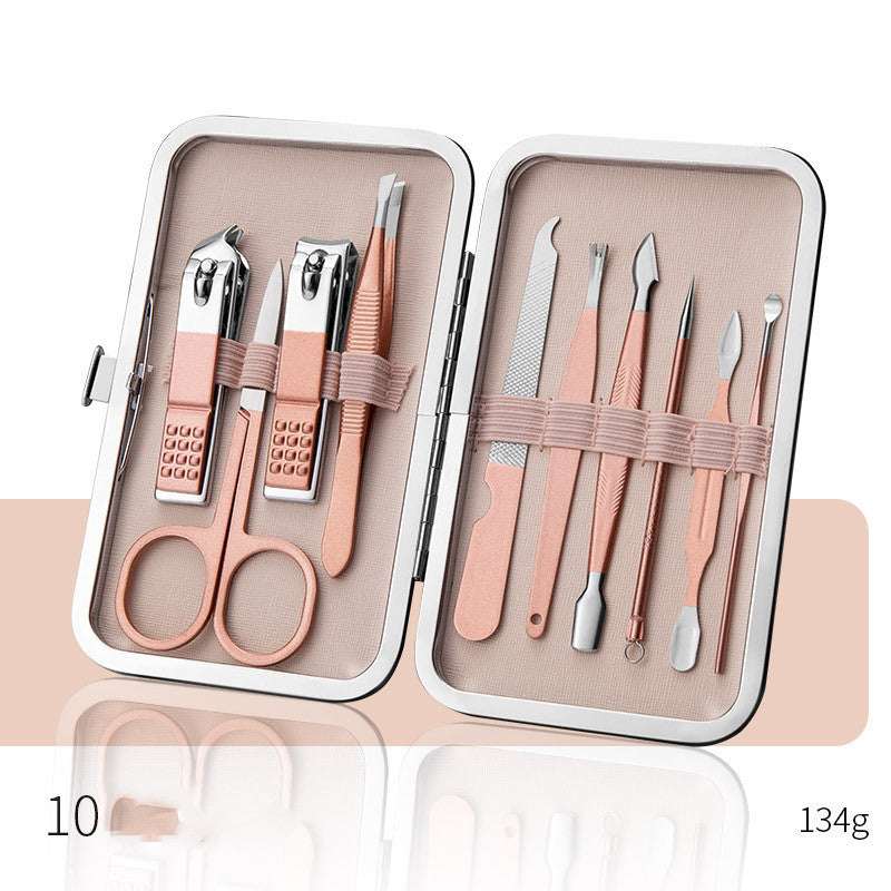 Professional nail clippers set with high-quality stainless steel tools in a rose gold leather case.