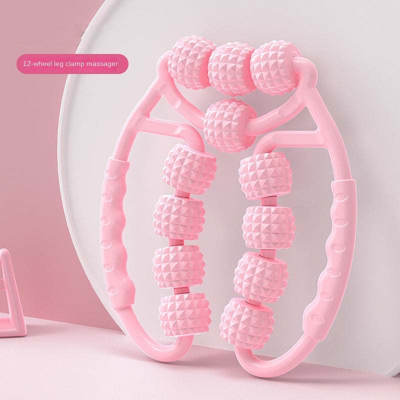 Muscle Relaxation Ring Leg Clip Roller in pink with textured rollers for massage therapy.