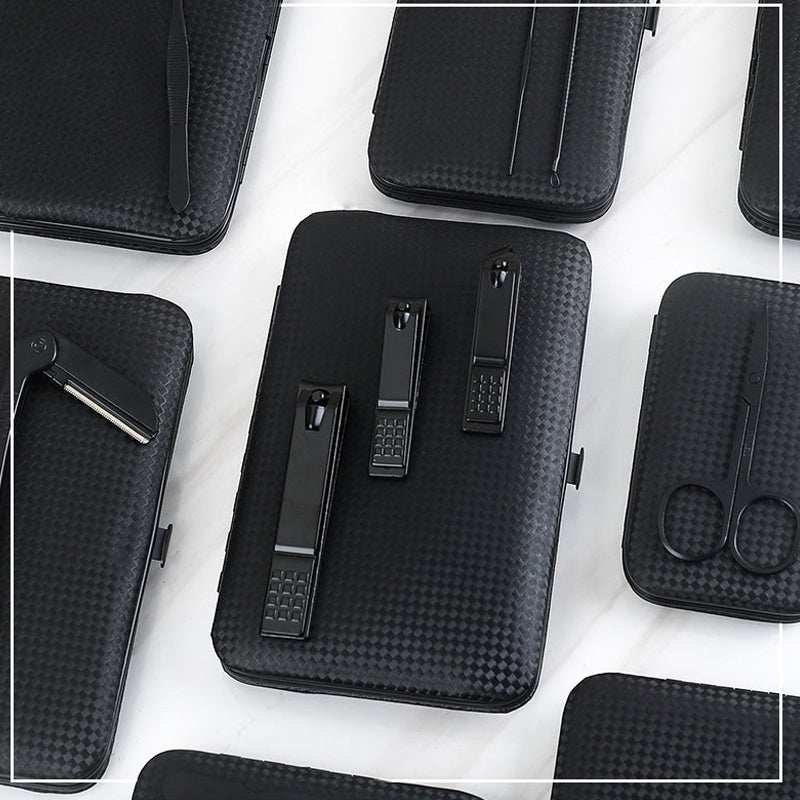Professional nail clippers set with high-quality stainless steel tools in a rose gold leather case.