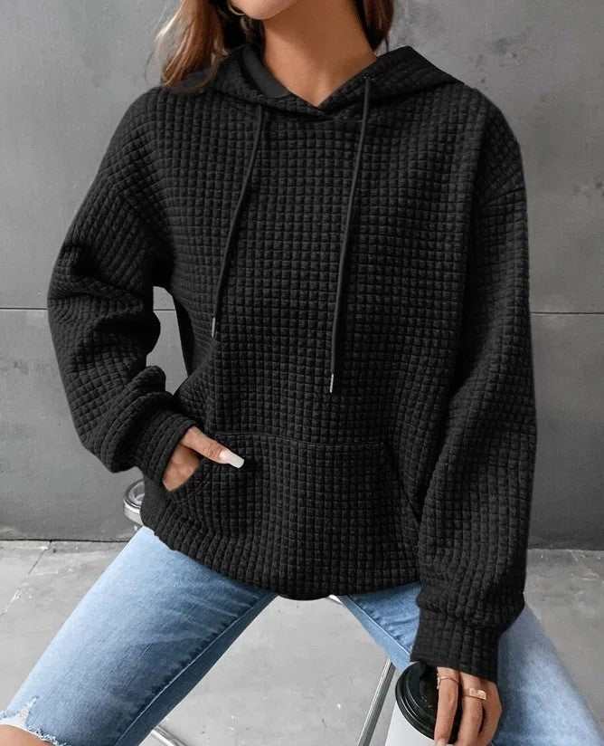 Women's loose casual solid color long-sleeved sweater with hood, available in multiple colors.