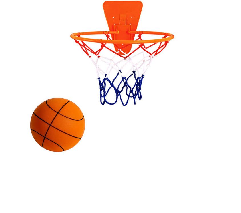 Child playing with Silent Sports Ball indoor basketball set, featuring vibrant bouncy balls in various colors and a hoop.