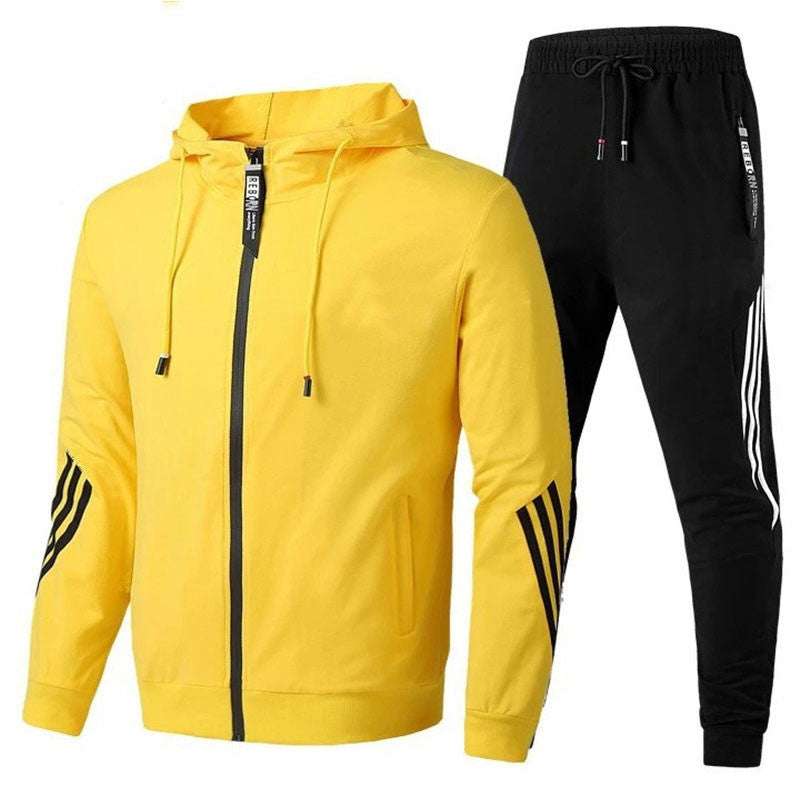 Men's leisure sports suit in navy blue with orange accents, hooded long-sleeve top, and trousers, suitable for spring and autumn.