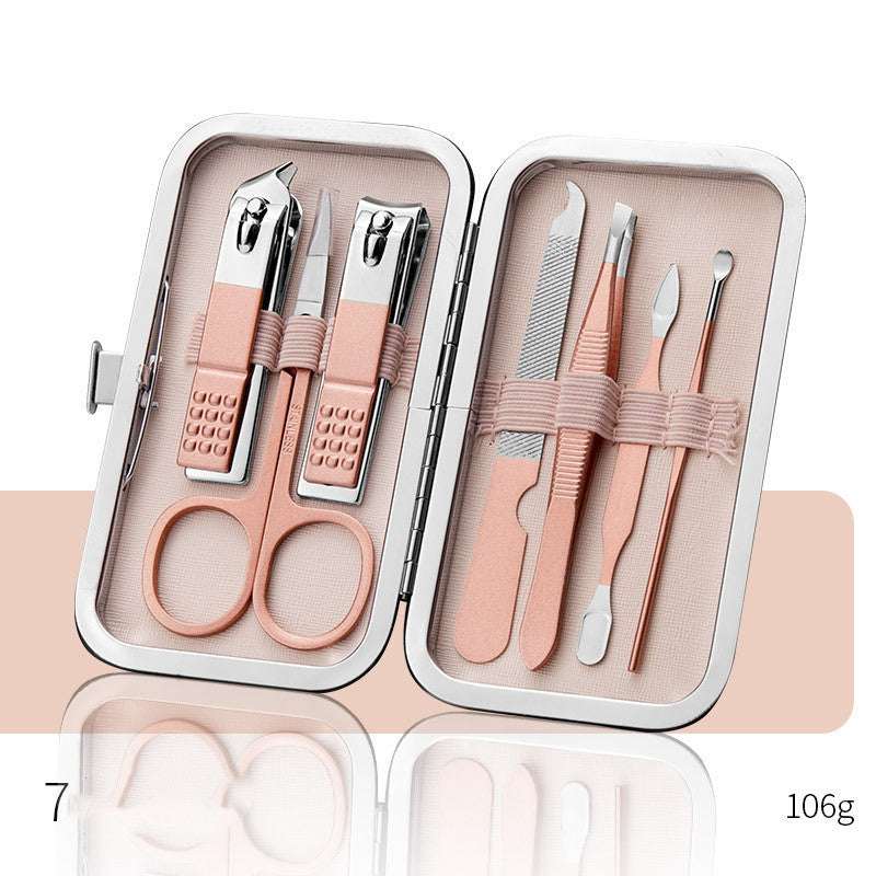 Professional nail clippers set with high-quality stainless steel tools in a rose gold leather case.