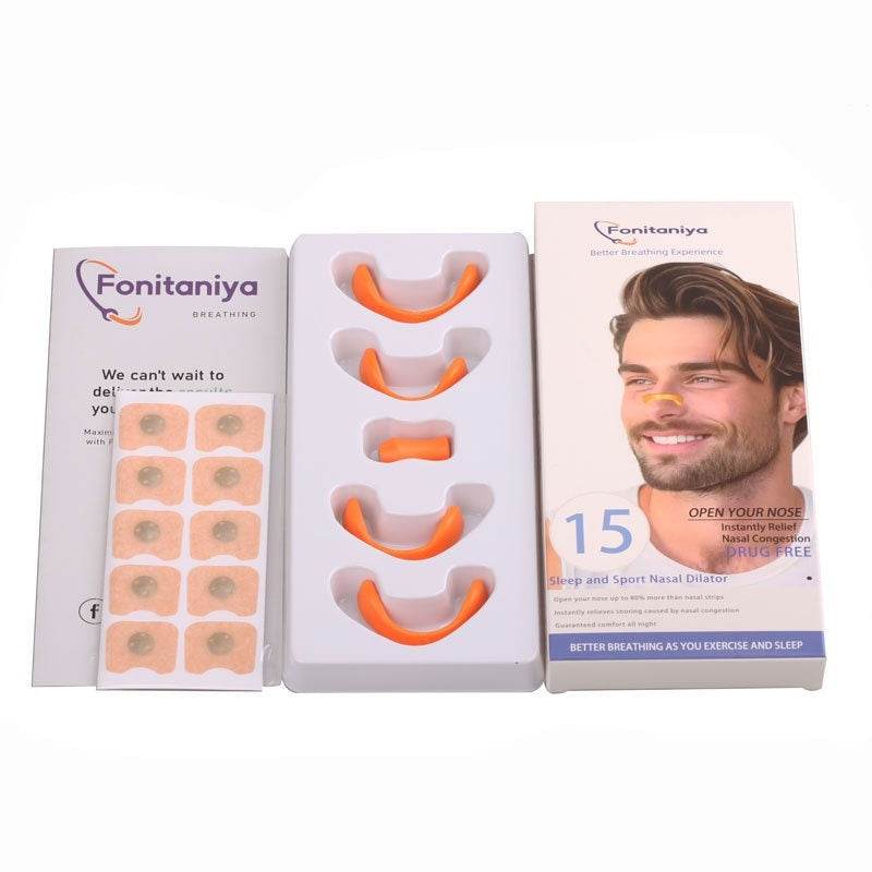 Nasal Respiratory Dilator with magnetic nose clips and adhesive strips for improved airflow.