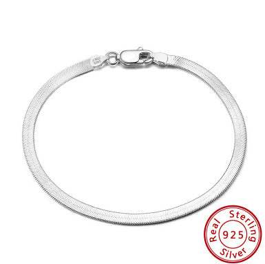 S925 sterling silver flat snake bone bracelet in platinum color, worn on wrist.