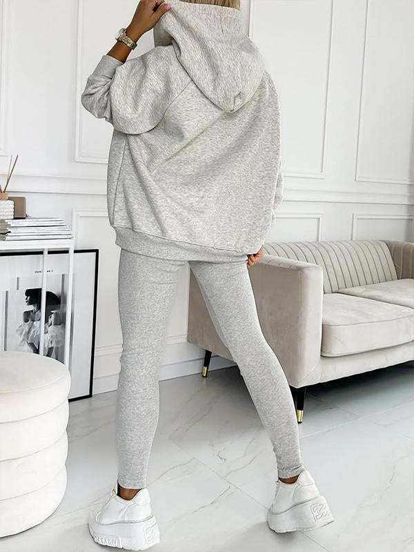 3pcs women's sports suit with hooded sweatshirt, vest, and slim trousers in light blue.