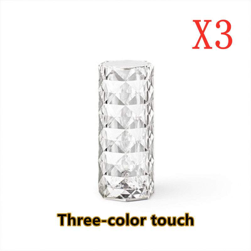 USB Table Lamps Nordic crystal USB table lamp with diamond design, touch dimming, and rose projector effect for bedroom decor.