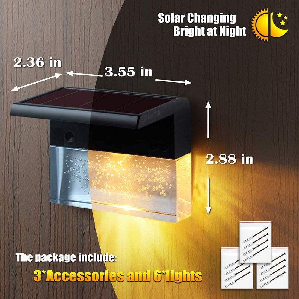 Waterproof New RGB RGB LED solar step lights illuminating a garden fence in multiple colors, waterproof and crystal-like for outdoor decoration.