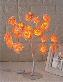LED Tree Lamp with colorful rose-shaped lights for indoor decoration.