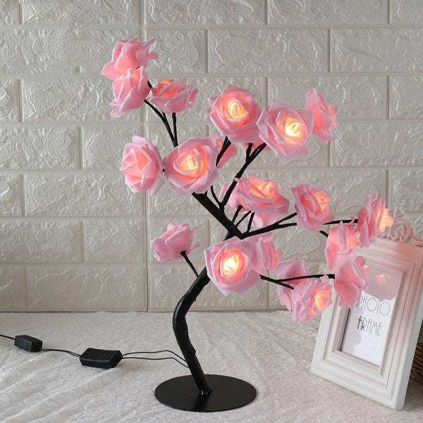 LED Tree Lamp with colorful rose-shaped lights for indoor decoration.