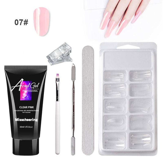 Extension Gel Nail Art Kit with accessories including UV/LED lamp, nail tools, and crystal gel.