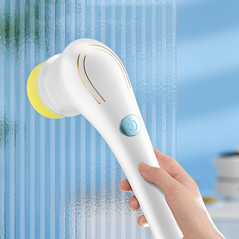 Electric handheld kitchen scrubber with five brush heads for versatile cleaning.