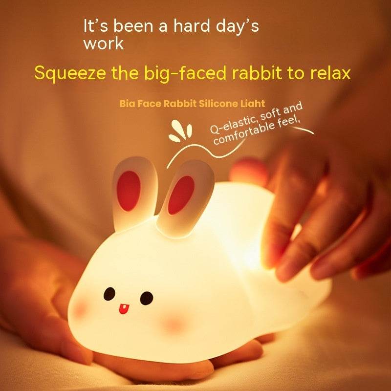 Cute LED night light with touch sensor, rabbit design, adjustable brightness, silicone material, perfect for kids' bedside.