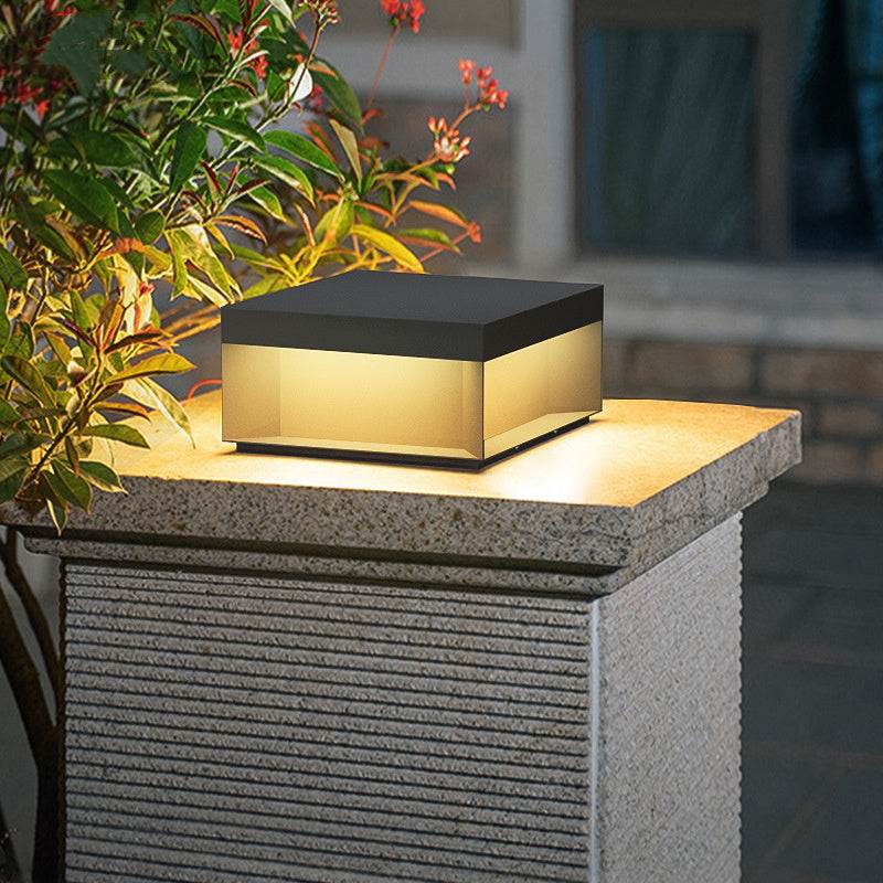 Waterproof solar garden lights illuminating a gravel pathway.